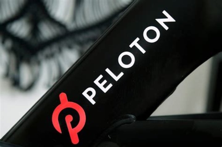 A Peloton logo on the company's stationary bicycle in San Francisco. Safety regulators are warning people with kids and pets to immediately stop using a treadmill made by Peloton after one child died and nearly 40 others were injured. The U.S. Consumer Product Safety Commission said, that it received reports of children and a pet being pulled, pinned and entrapped under the rear roller of the treadmill, leading to fractures, scrapes and the death of one child Peloton Safety Warning, San Francisco, United States - 19 Nov 2019