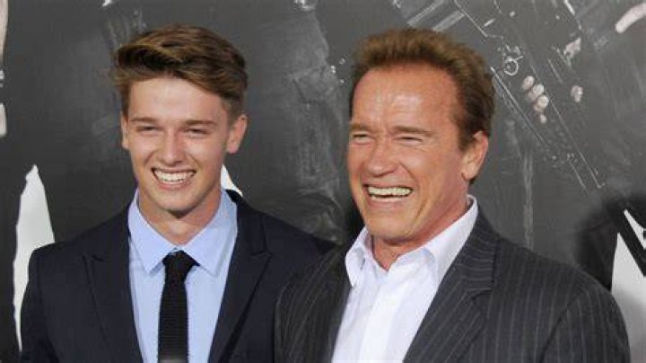 Arnold Schwarzenegger (R) and son Patrick Schwarzenegger at the Los Angeles premiere of &lsquo;The Expendables 2&rsquo;