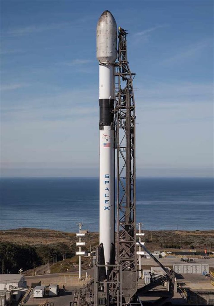 Falcon 9 SpaceX rocket with a payload of approximately 60 satellites for SpaceX's Starlink broadband network lifts off from pad 39A at the Kennedy Space Center in Cape Canaveral, Fla Rocket Launch, Cape Canaveral, United States - 18 Mar 2020