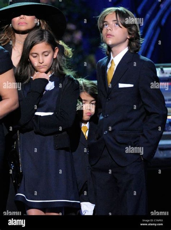 Paris Jackson, left, Prince Michael Jackson I and Prince Michael Jackson II on stage during the memorial service for Michael Jackson at the Staples Center in Los Angeles, Tuesday, July 7, 2009. (AP Photo/Mark J. Terrill, Pool)