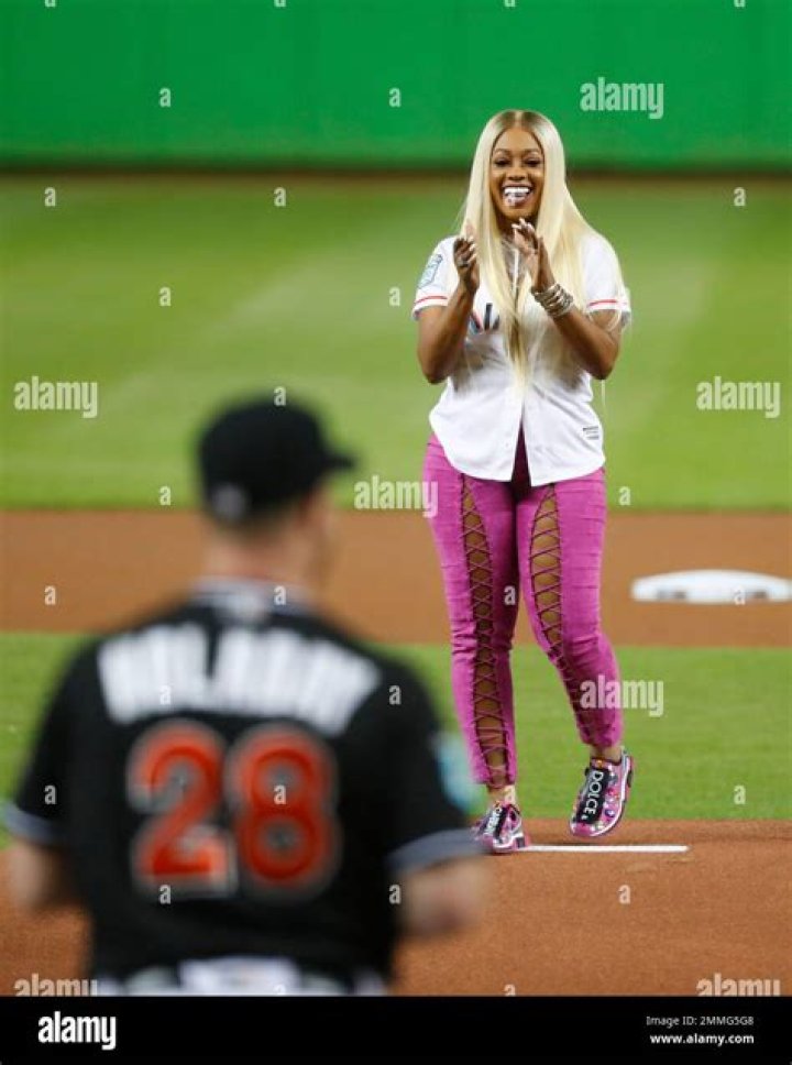 Rapper Trina reacts after throwing out a ceremonial first pitch before the start of a baseball game between the Miami Marlins and the Cincinnati Reds, in MiamiReds Marlins Baseball, Miami, USA - 21 Sep 2018