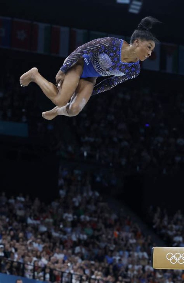 Simone Biles dismounts from the beam during the US Gymnastics Championships Women's Day 2 at SAP Center in San Jose, California, USA, 27 August 2023. US Gymnastics Championships, San Jose, USA - 27 Aug 2023
