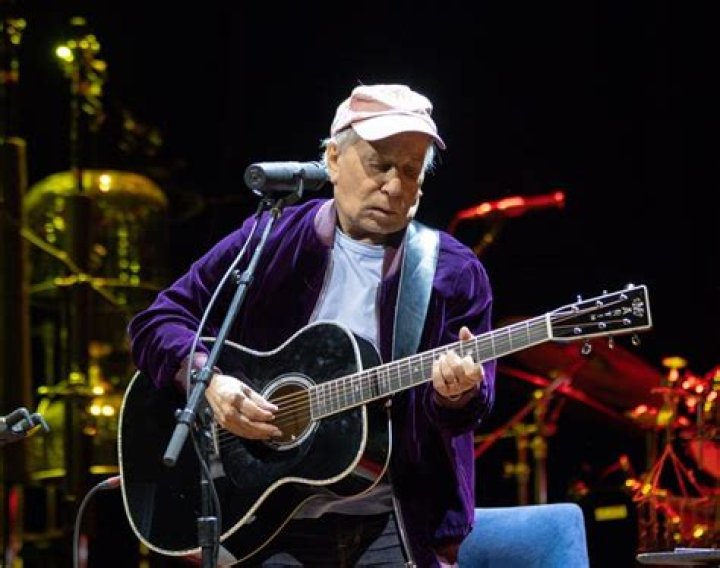 Singer-songwriter Paul Simon performs during the Democratic National Convention at Wells Fargo Center in Philadelphia, Pennsylvania, on July 25, 2016. The delegates will confirm the nomination of Hillary Clinton and Tim Kaine as the Democratic ticket for the November election. Singer-songwriter Paul Simon performs at the DNC convention in Philadelphia, Pennsylvania, United States - 25 Jul 2016