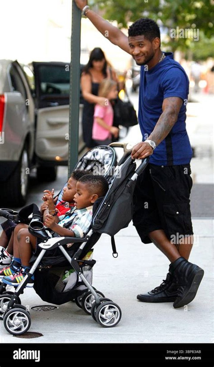 Usher with his sons